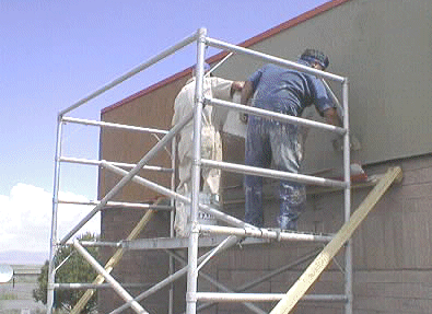 Repairing the stucco on the Visitor Center